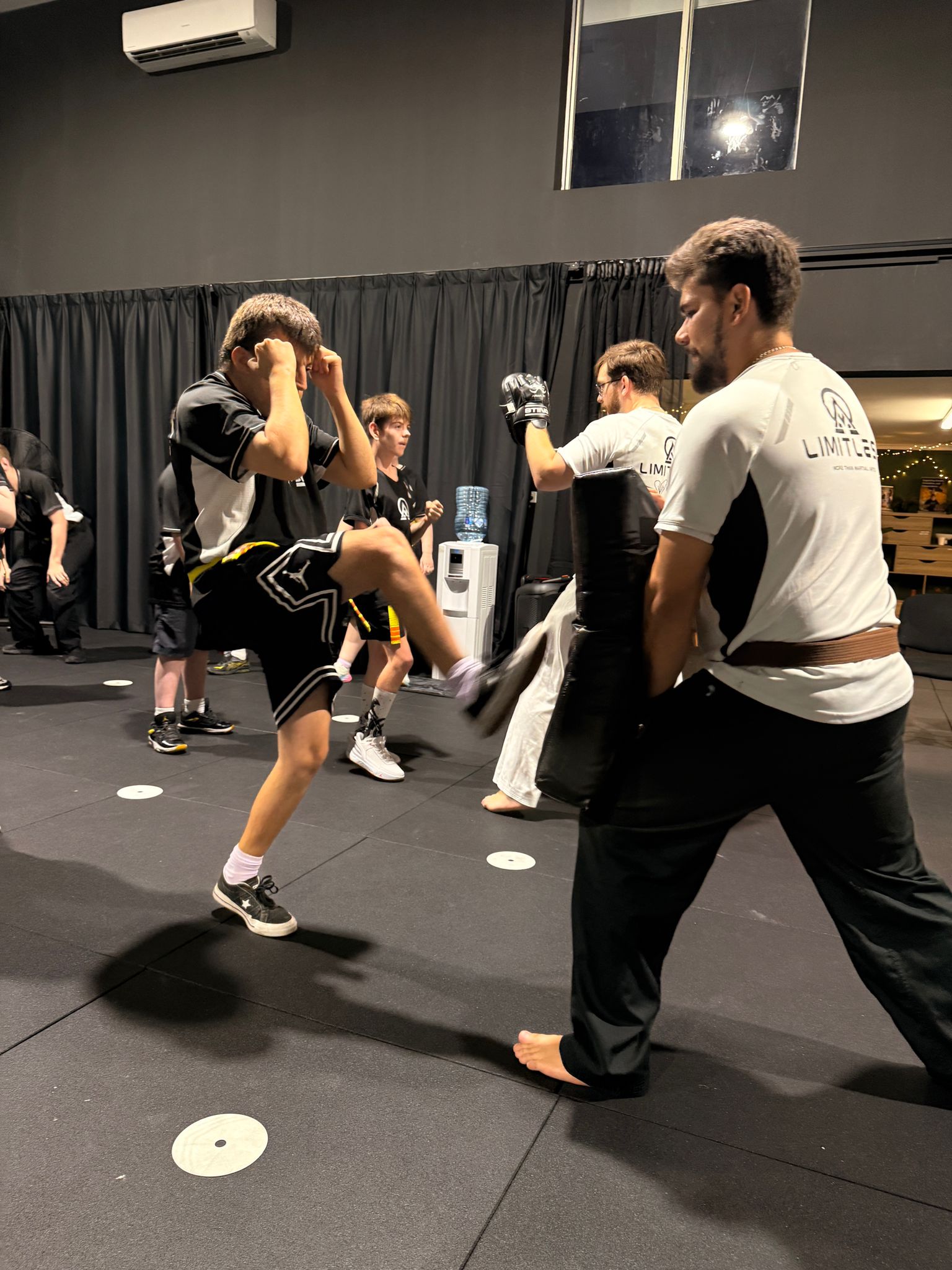 A Limitless Impact participant practising with an instructor